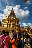 Chiang Mai - Buddhist pilgrims perform pradakrisna at Wat Phra That Doi Suthep. 